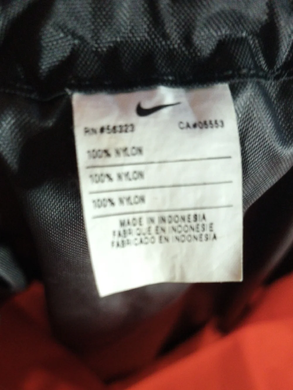 Nike Orange And Black Reversible Drawstring Backpack with White Swoosh